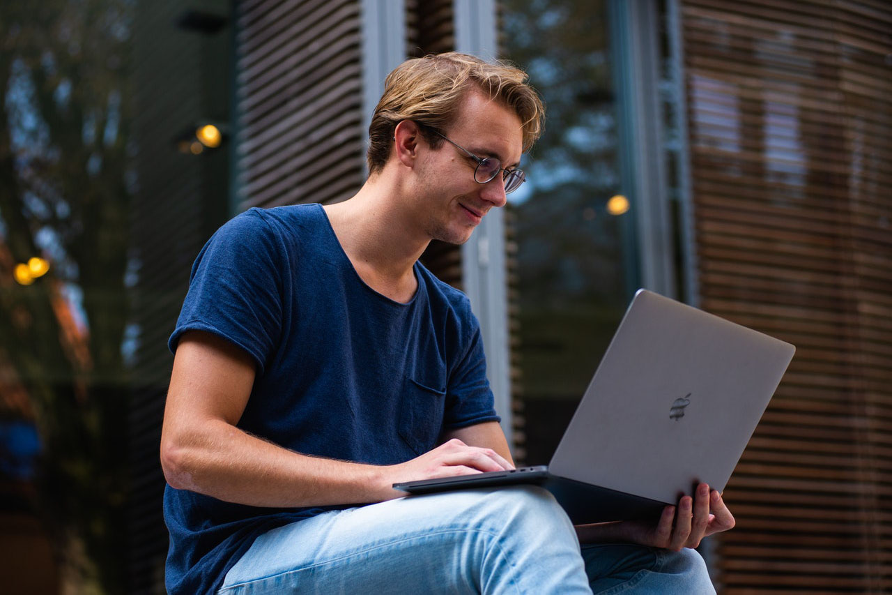 selective-focus-photo-of-man-using-laptop